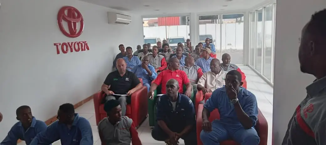 Automotive workshop personnel attending a structured safety training session in Mogadishu